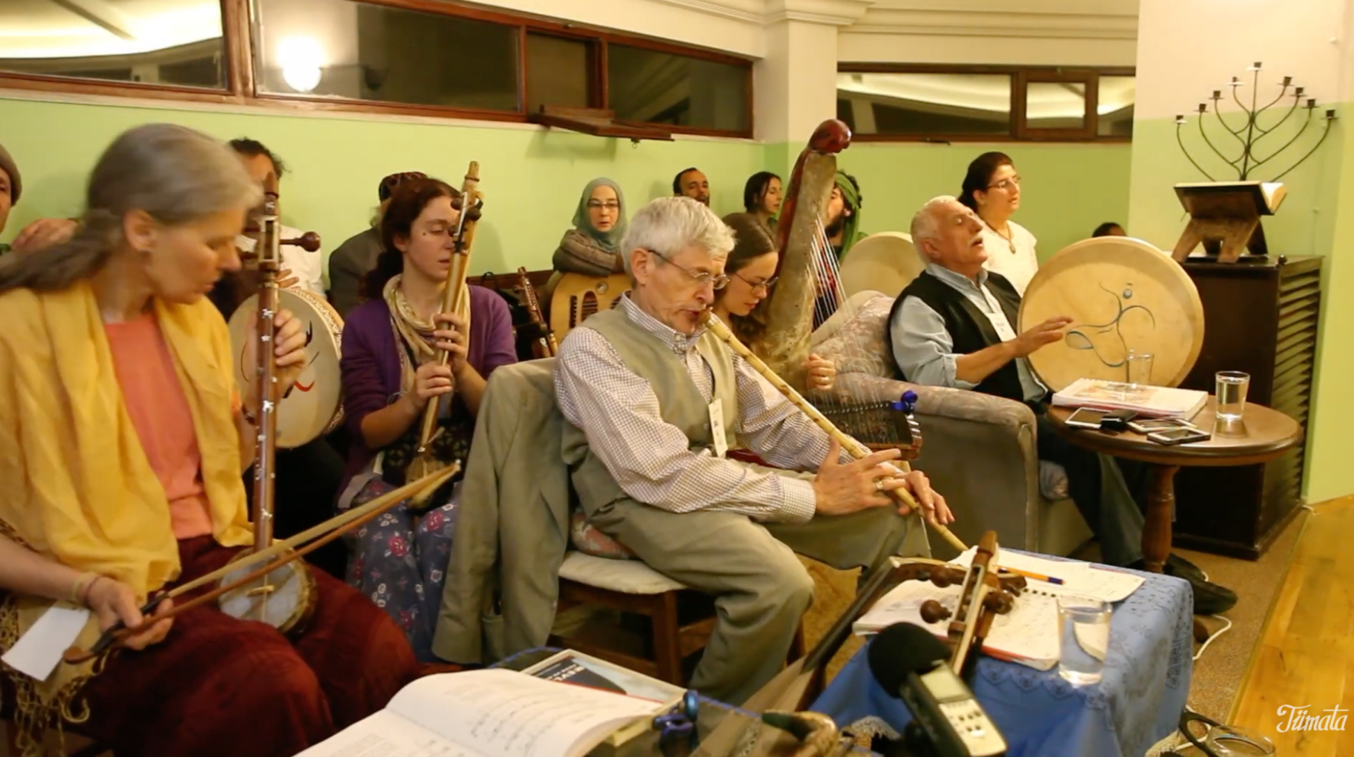 Dr. Rahmi Oruç Güvenç plays with TÜMATA at a Sema gathering